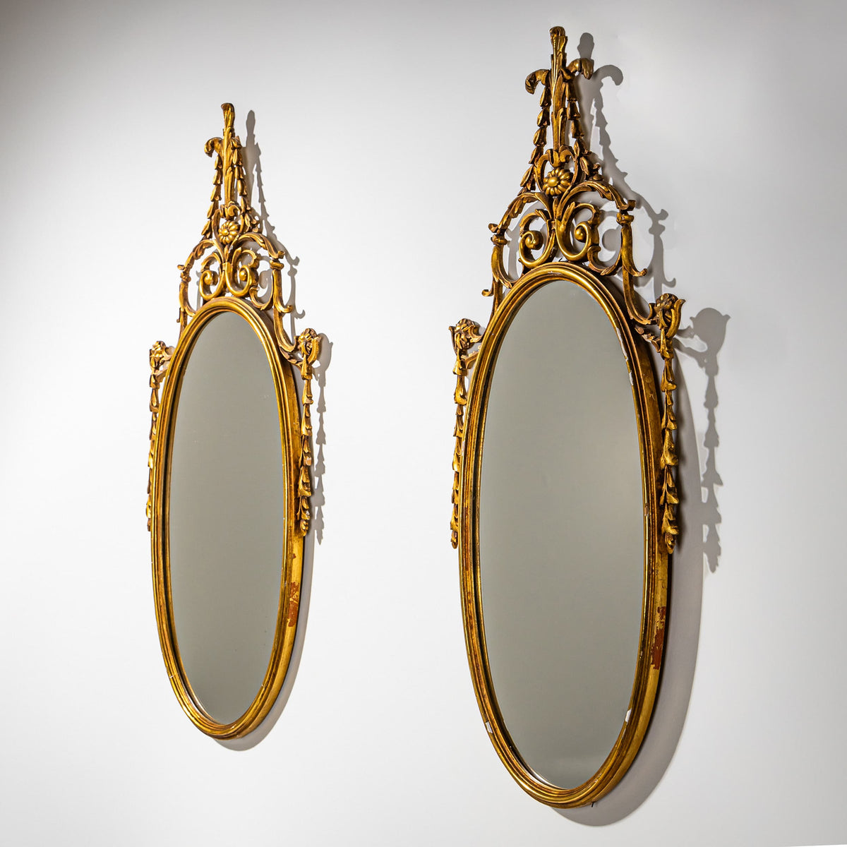 Pair of oval Giltwood Wall Mirrors, Italy Mid-20th Century