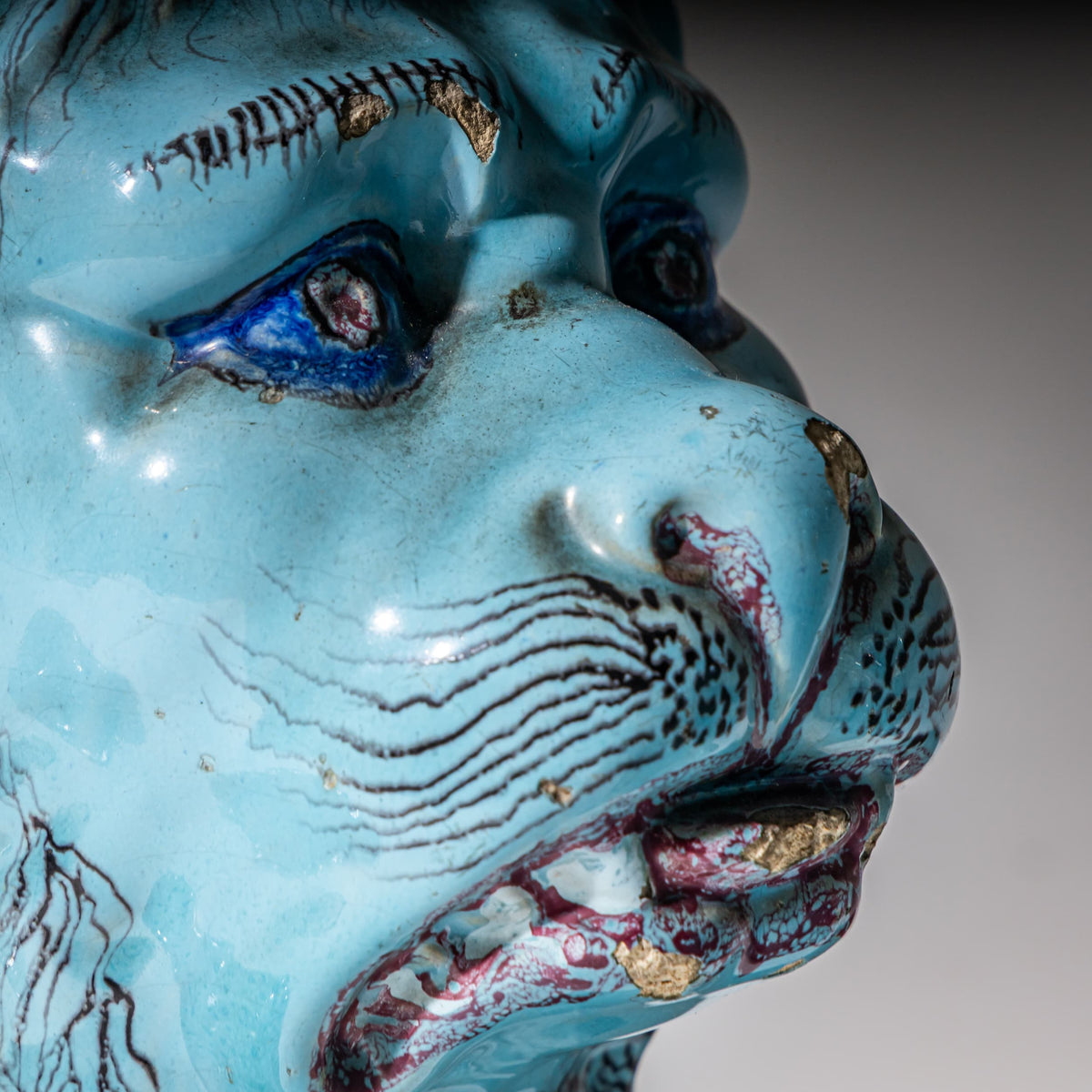 Pair of Recumbent Blue Faience Lions, probably France, 18th Century