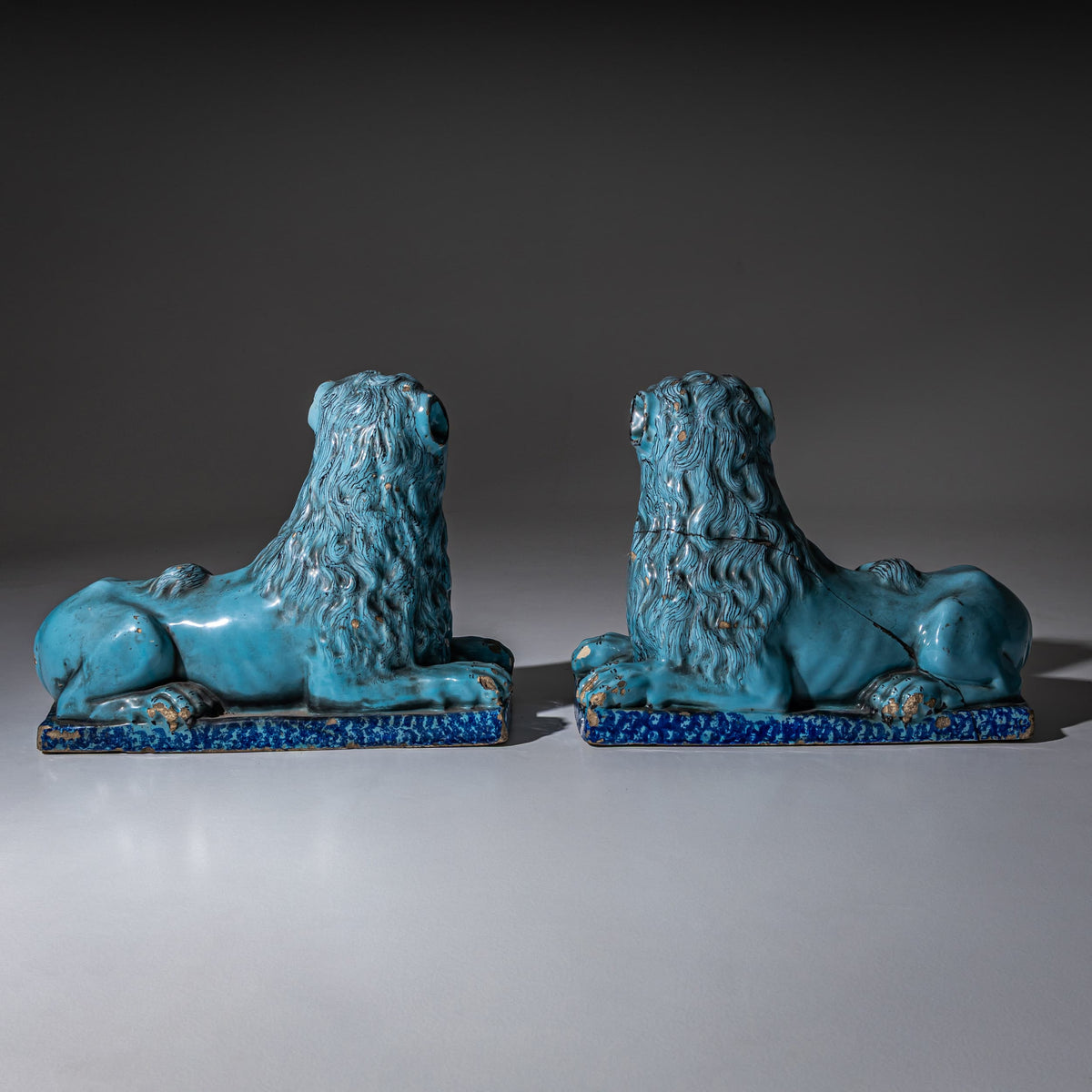 Pair of Recumbent Blue Faience Lions, probably France, 18th Century