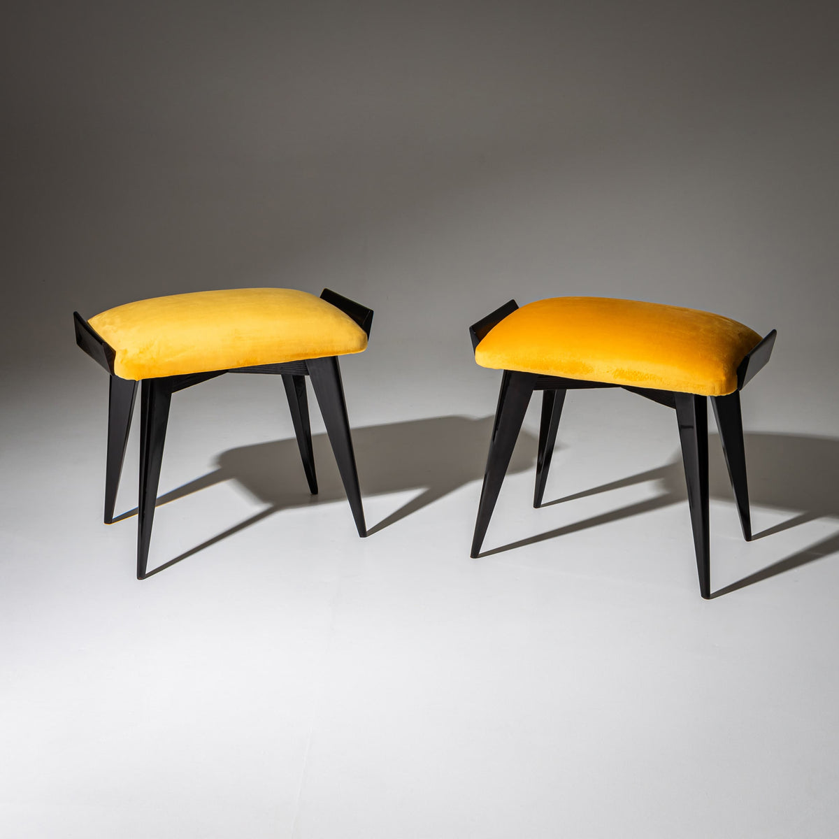 Pair of Ebonized Stools with Yellow Upholstery, probably Italy, Mid-20th Century