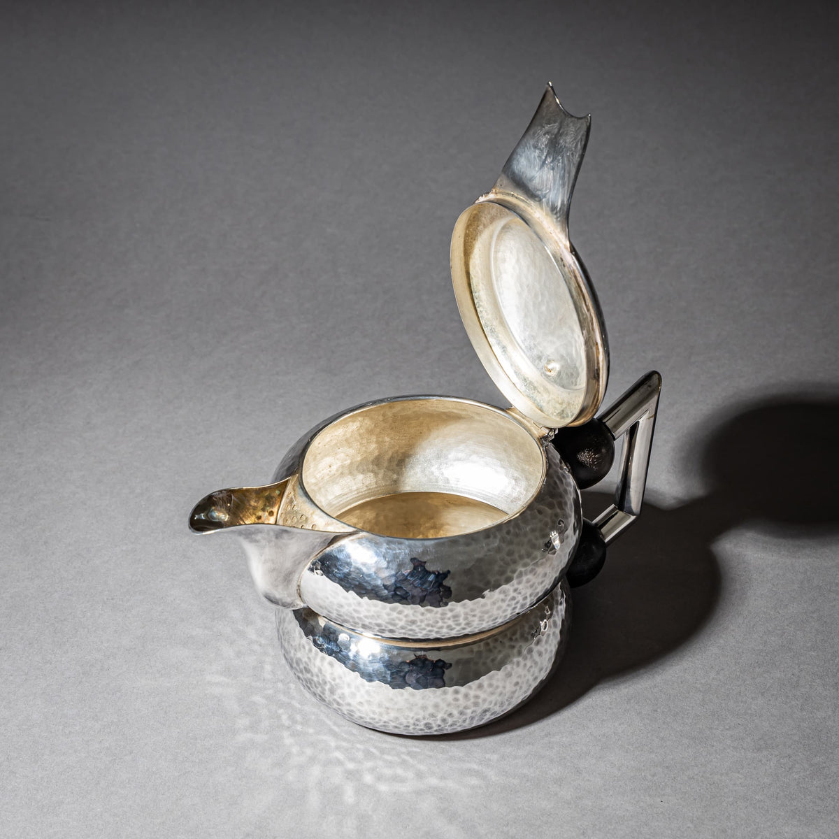 Three-Piece Art Deco Tea and Coffee Service with Hammered Surface, First Half 20th Century