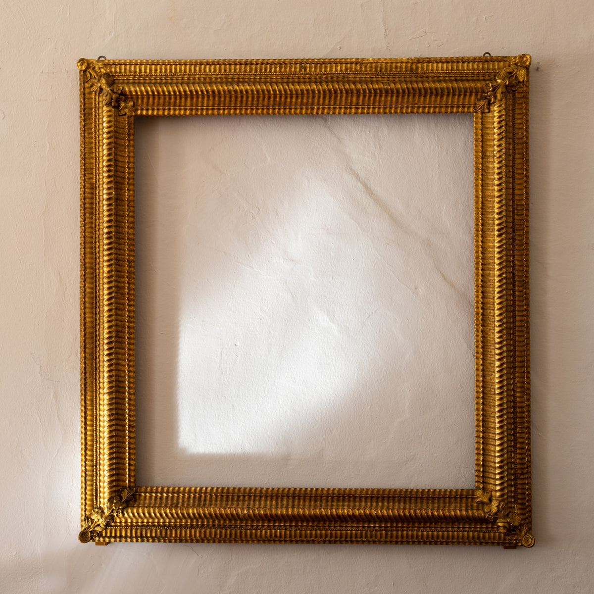 Gold patinated mirror frame, 19th century