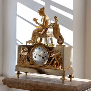 Empire Mantel Clock with reading young lady, early 19th century