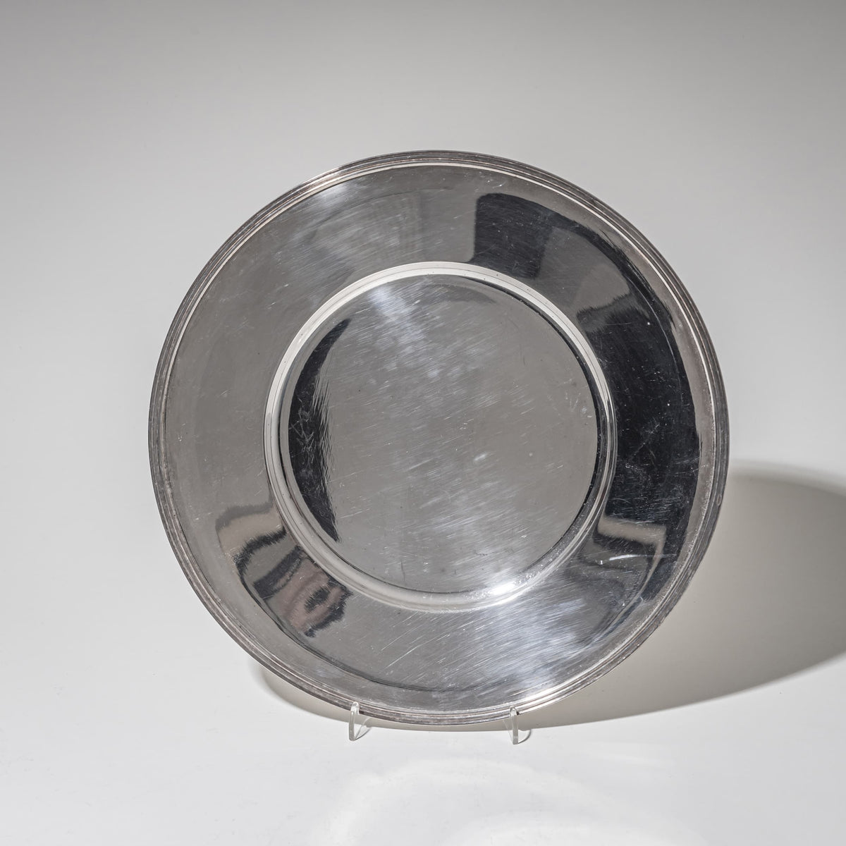 Two Silver Charger Plates, Marked Wilkens