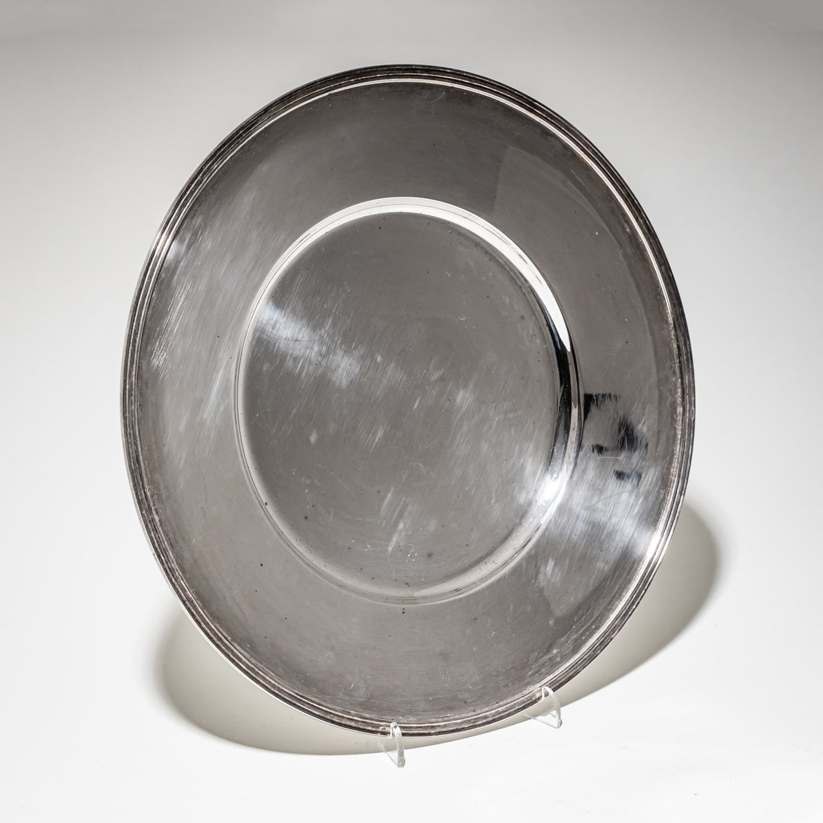 Two Silver Charger Plates, Marked Wilkens