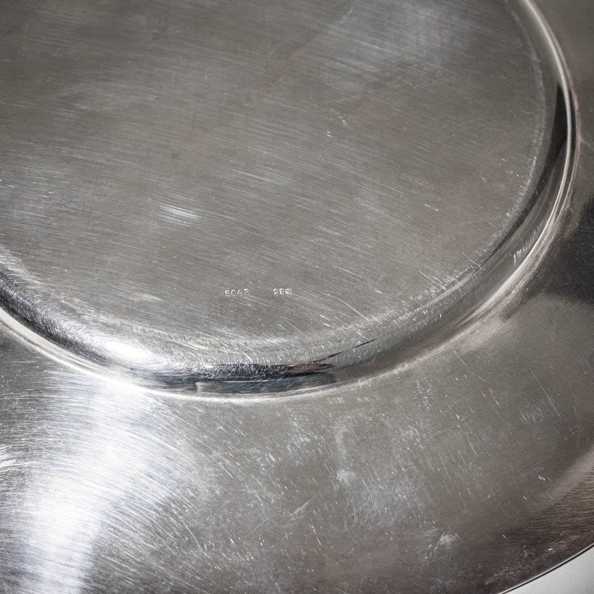 Two Silver Charger Plates, Marked Wilkens
