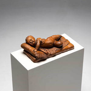 Reclining infant in terracotta, sign. F. Sans, probably Spain, Late 19th century