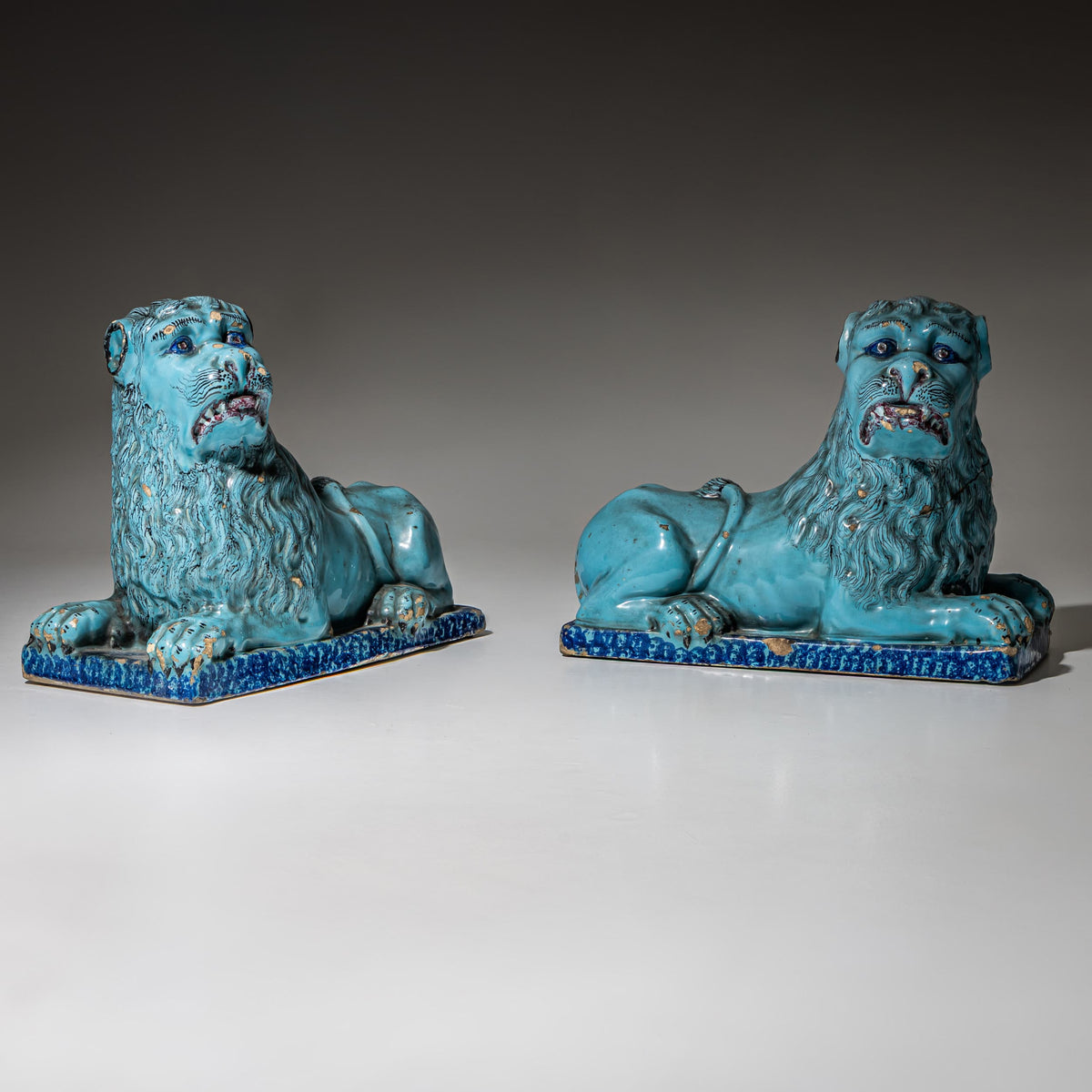 Pair of Recumbent Blue Faience Lions, probably France, 18th Century
