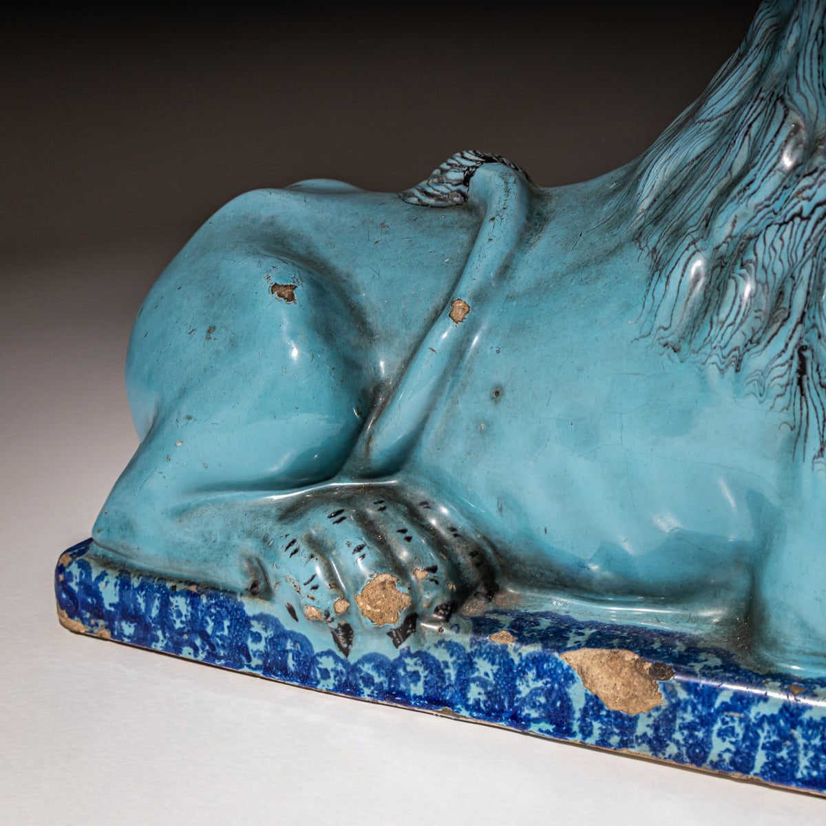 Pair of Recumbent Blue Faience Lions, probably France, 18th Century
