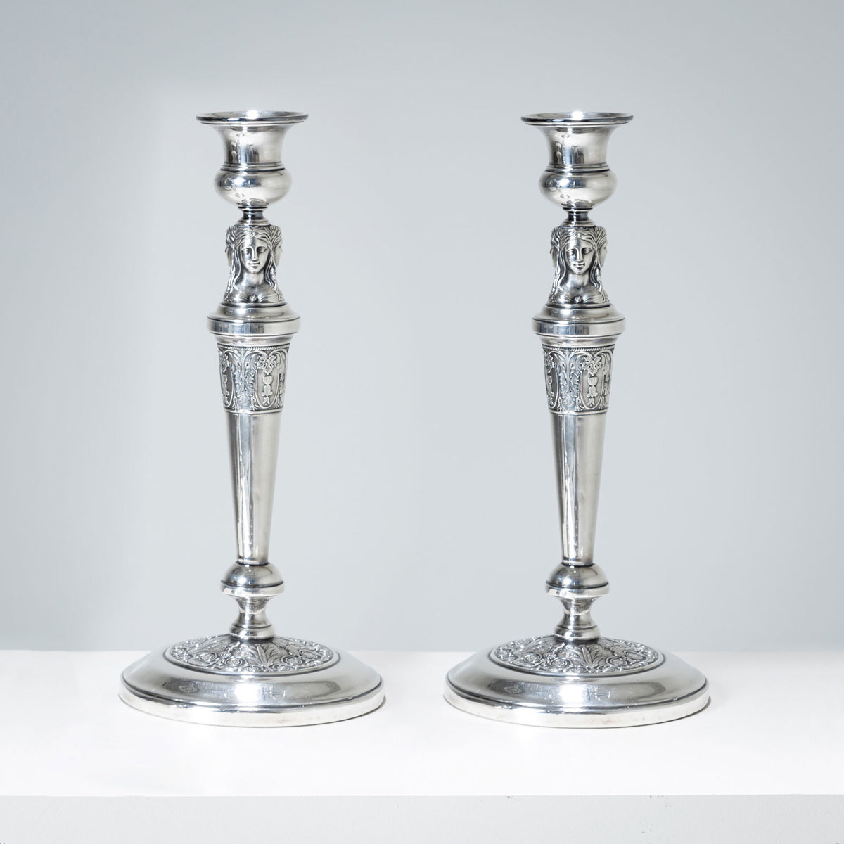 Pair of silver-plated Candlesticks, probably 19th Century
