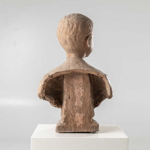 Bust of a boy in terracotta, signed H.M. Becoré, France, 2nd half of the 19th century