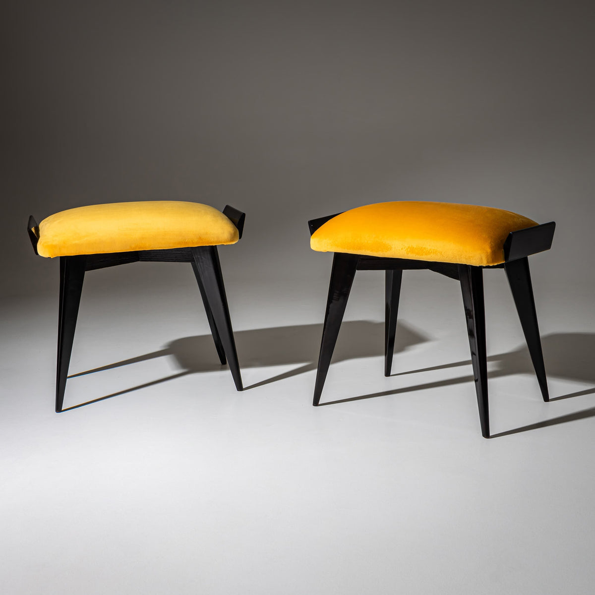 Pair of Ebonized Stools with Yellow Upholstery, probably Italy, Mid-20th Century