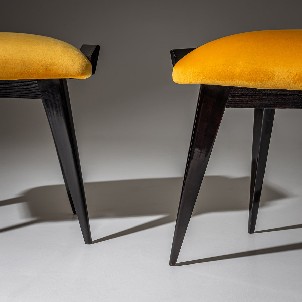 Pair of Ebonized Stools with Yellow Upholstery, probably Italy, Mid-20th Century