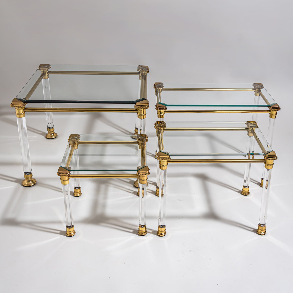 Two Coffee Tables in Plexiglass and Brass, probably Italy, Late 20th Century