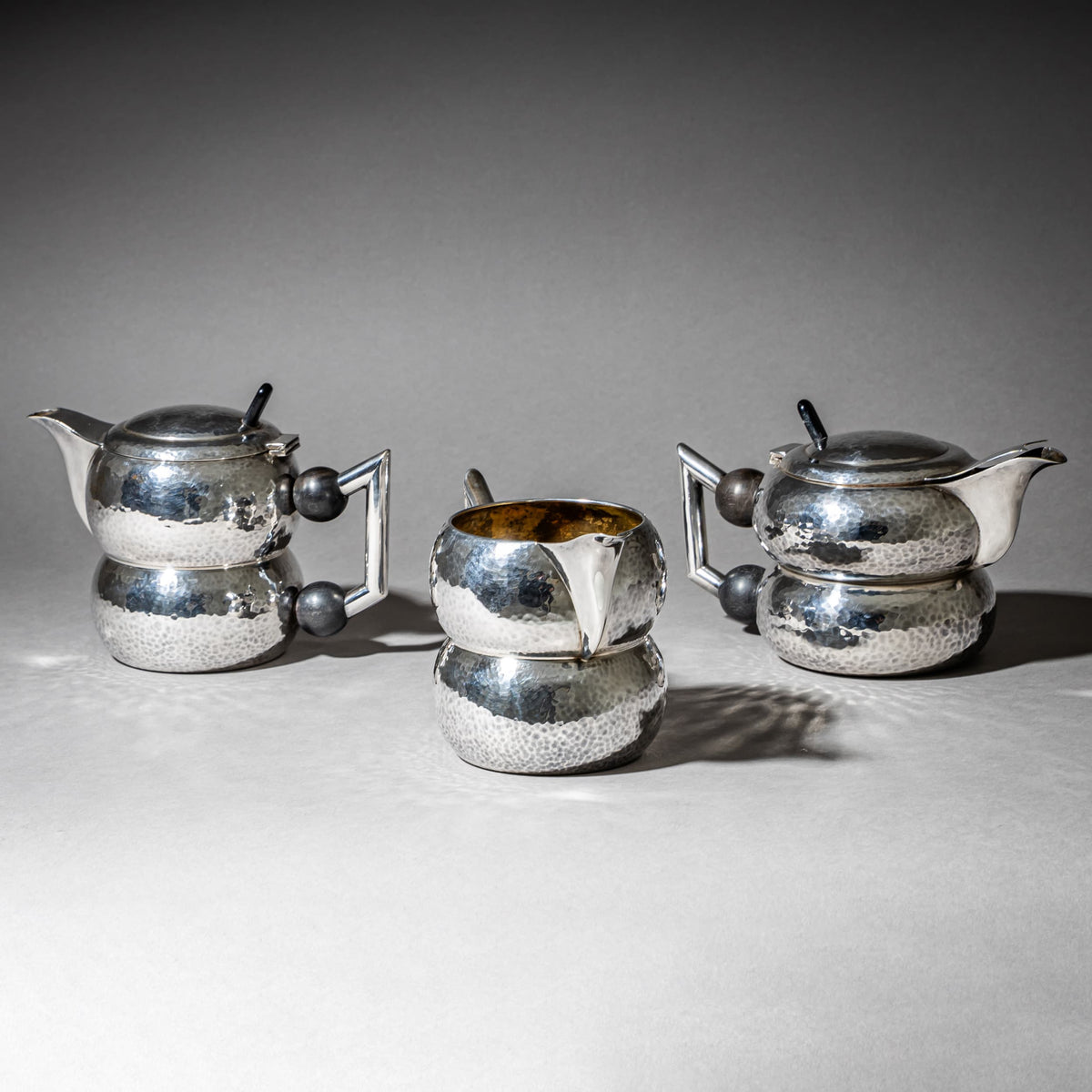 Three-Piece Art Deco Tea and Coffee Service with Hammered Surface, First Half 20th Century