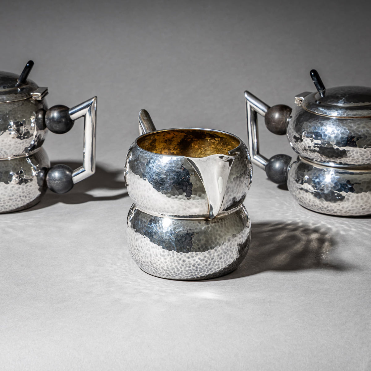 Three-Piece Art Deco Tea and Coffee Service with Hammered Surface, First Half 20th Century