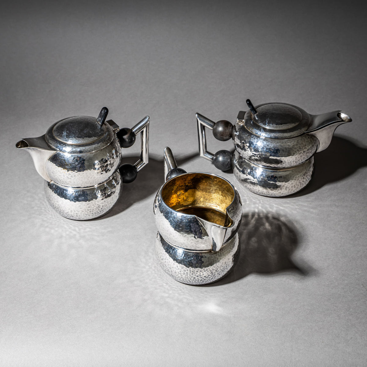 Three-Piece Art Deco Tea and Coffee Service with Hammered Surface, First Half 20th Century