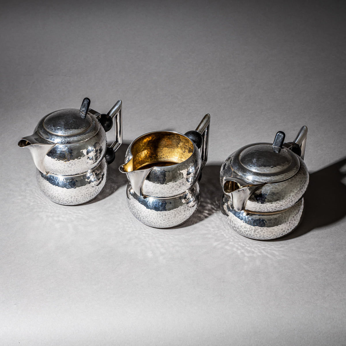 Three-Piece Art Deco Tea and Coffee Service with Hammered Surface, First Half 20th Century
